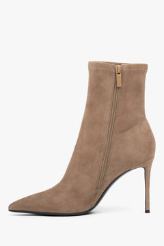 Women’s ankle boots Estro, beige, with stretch shaft, on high stiletto heel.
