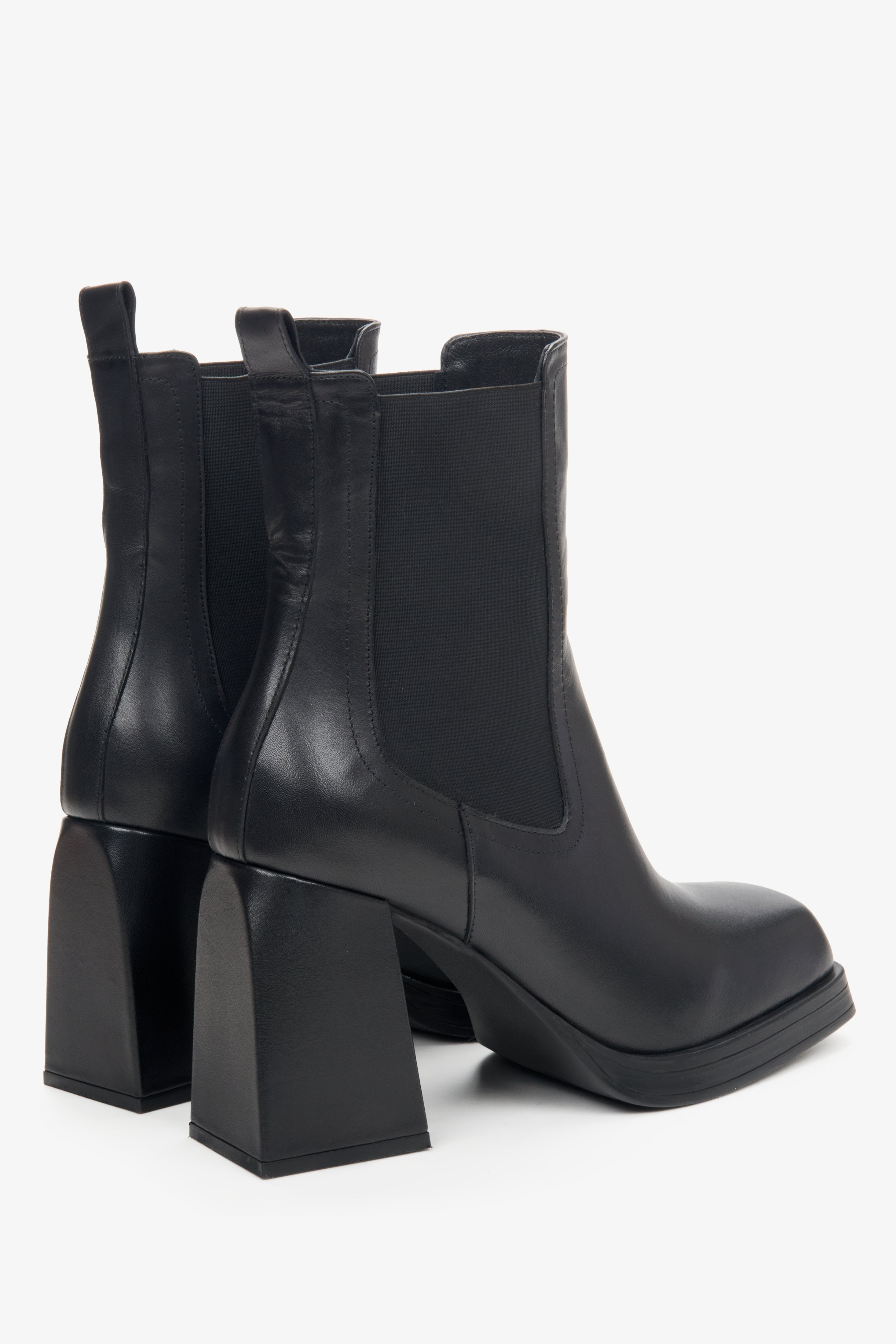 Women's black leather boots by Estro - close-up on the side line and heel.