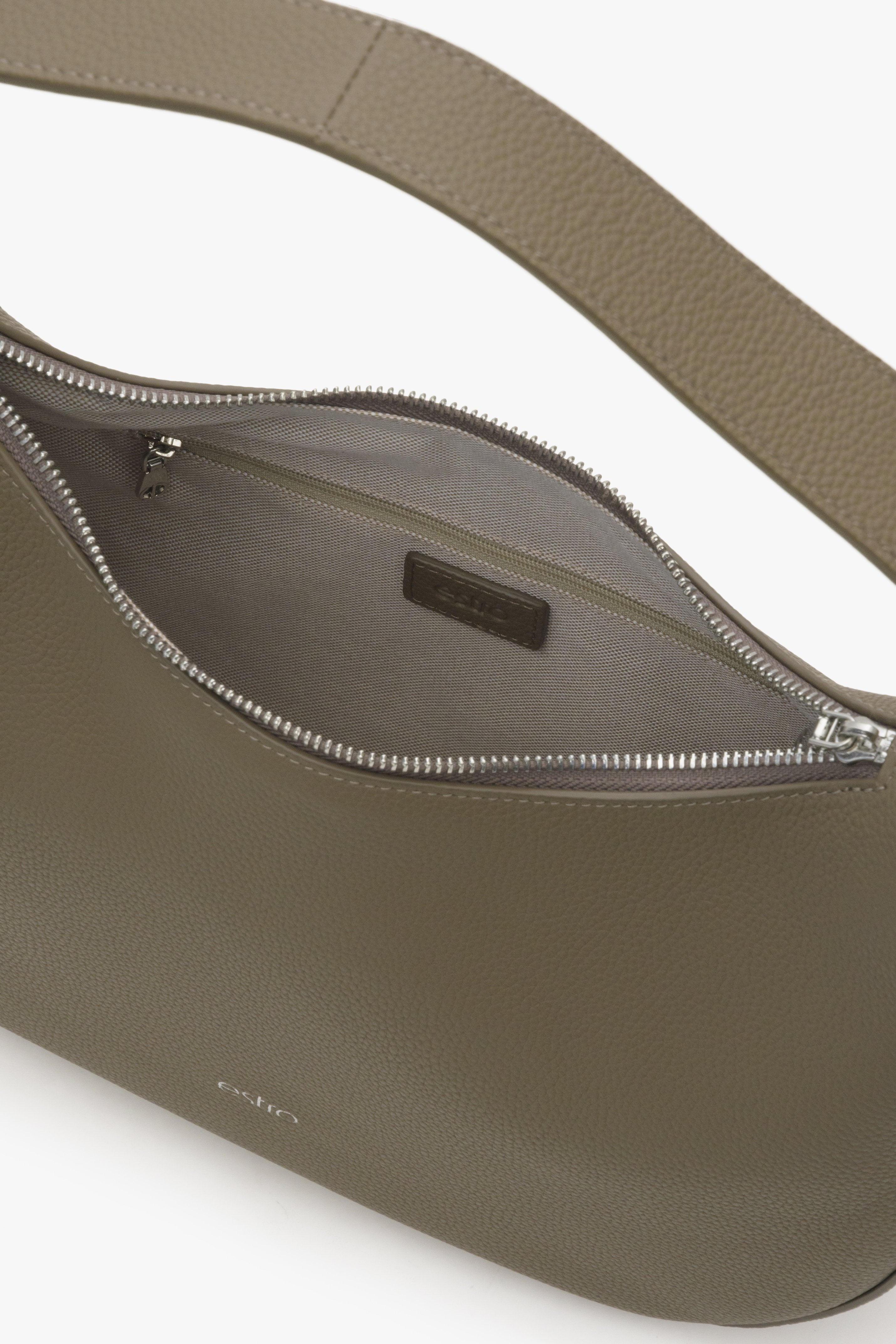 Women's brownish-gray crescent-shaped Estro handbag - close-up on the details.