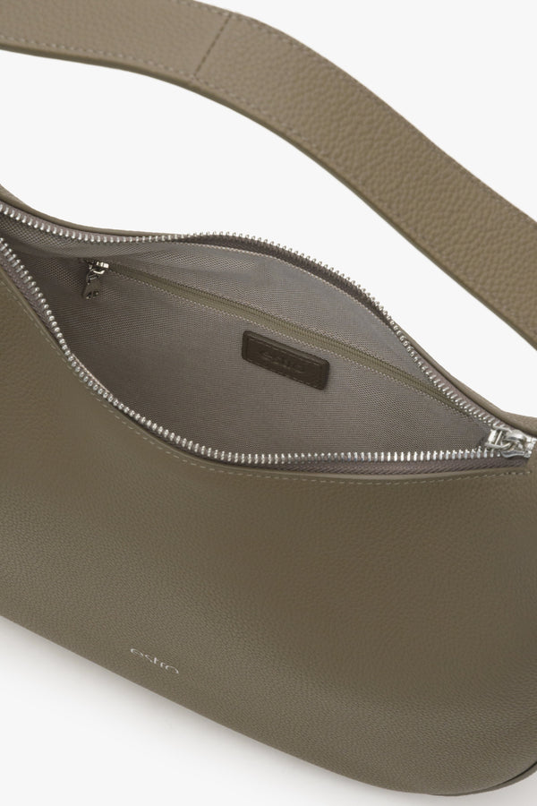 Women's brownish-gray crescent-shaped Estro handbag - close-up on the details.