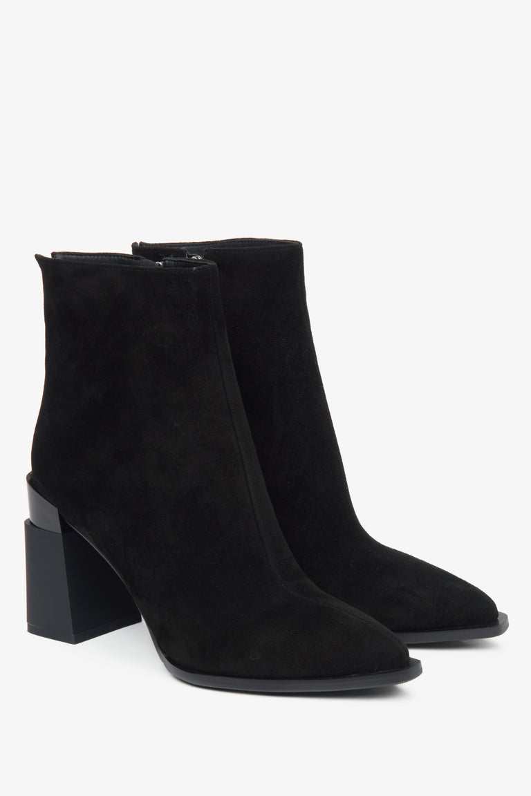 Women's black ankle boots made of genuine velour with a high heel and insulation by Estro.