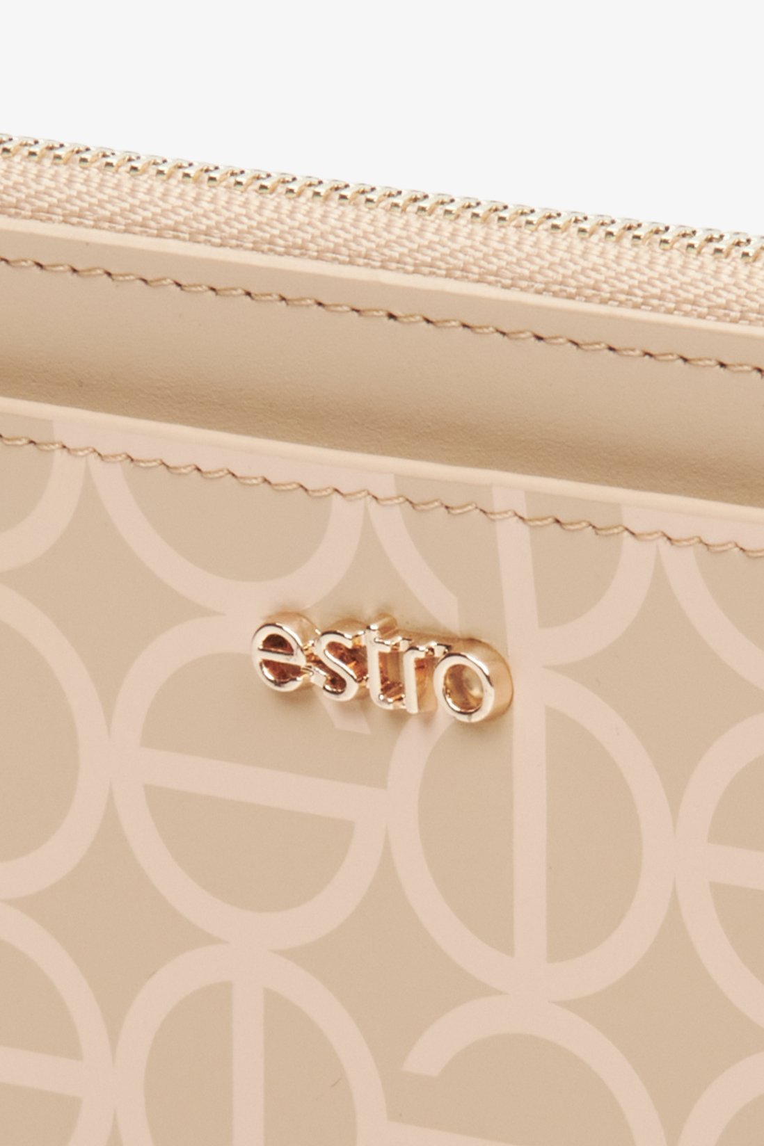Women's, large beige wristlet made of genuine leather by Estro - close-up on the details.