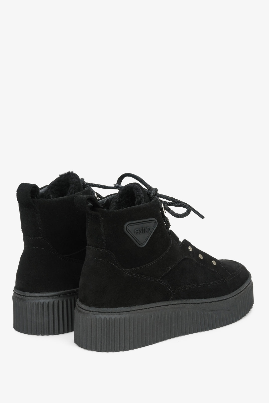 Winter high-top women's sneakers with warm lining by Estro: laced, suede - close-up on the back of the shoe.