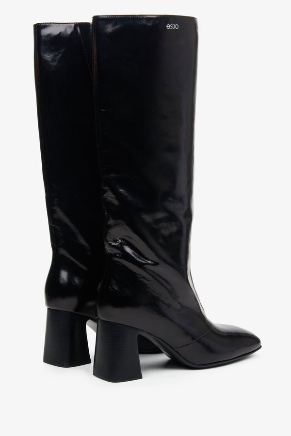 Women's oversized shaft patent leather high boots in black.