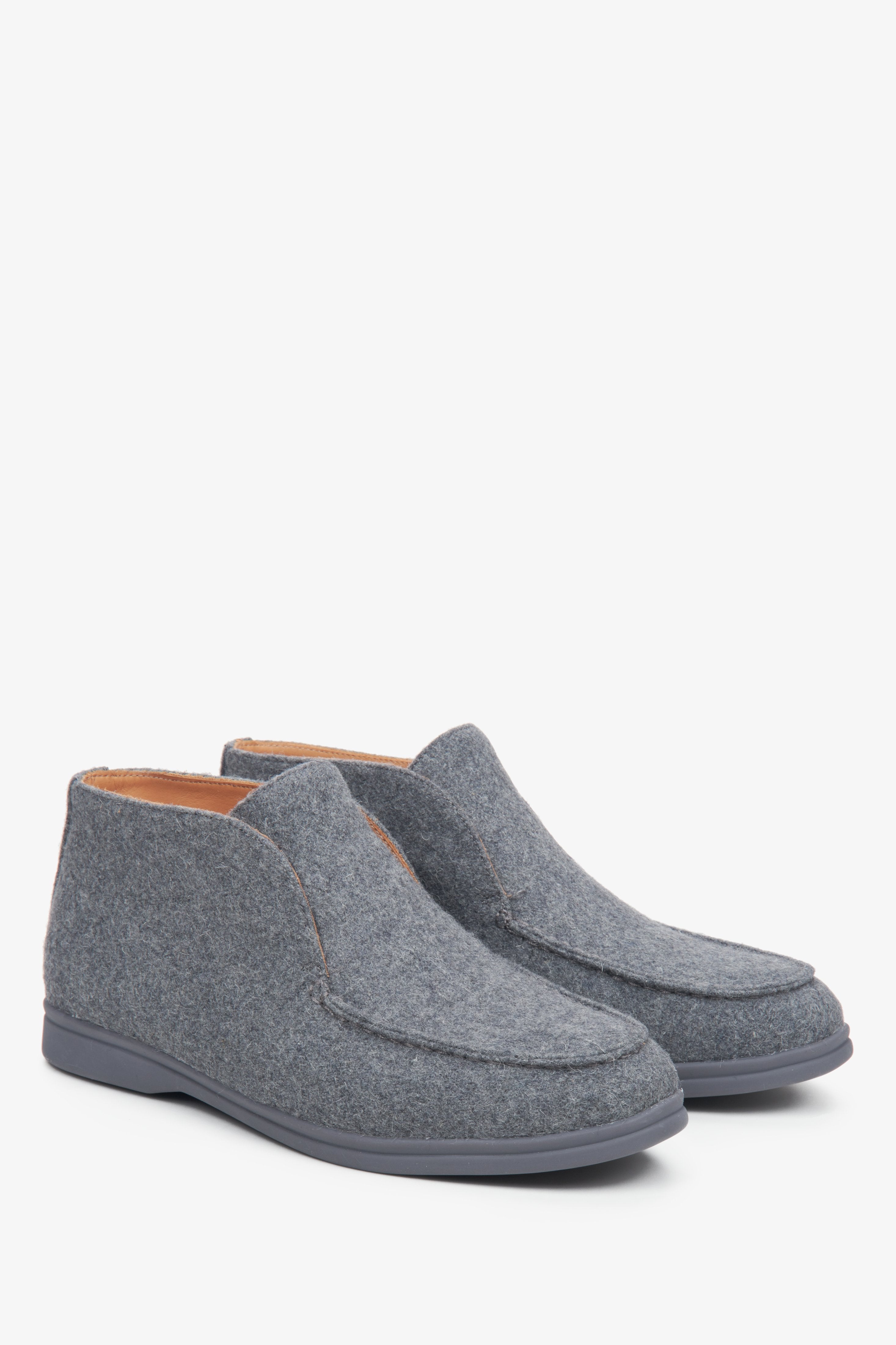 Women's grey elevated moccasins by Estro.