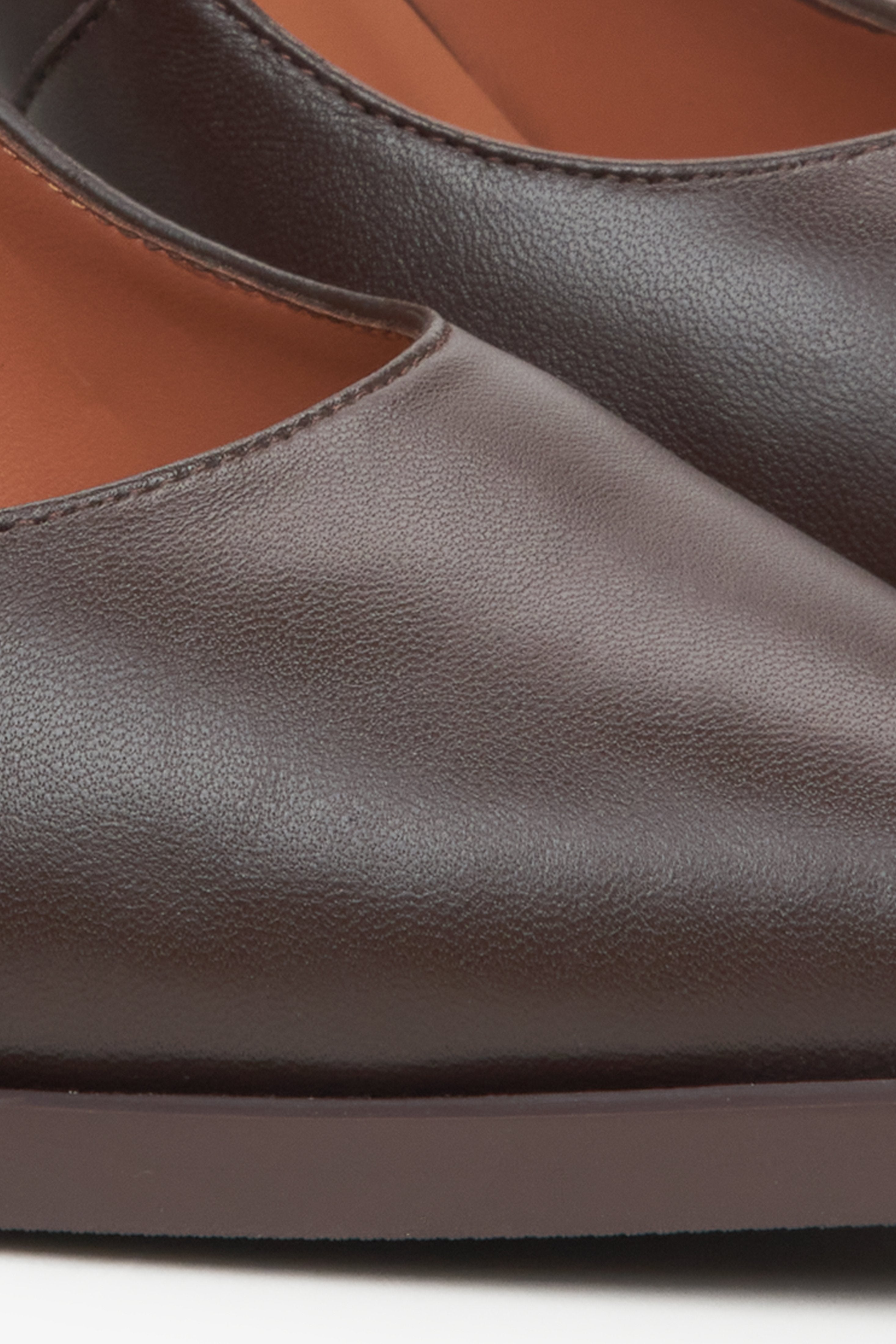 Women's dark brown leather pumps by Estro - close-up on detail.