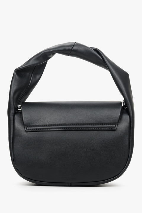 Women's leather, small black handbag - close-up on the back view.