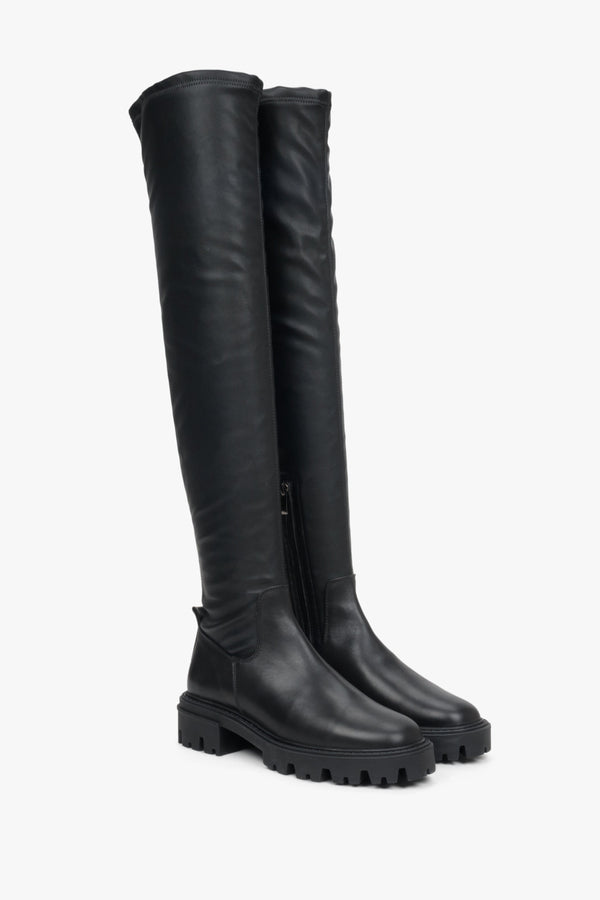 Black, high leather women's boots for autumn by Estro.