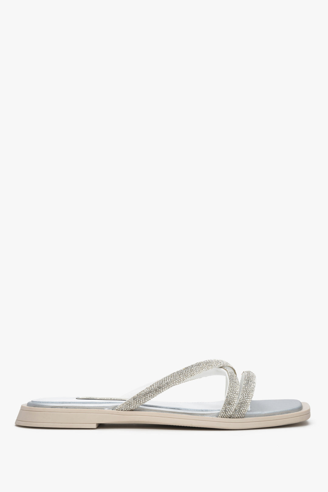 Women's silver flat slide sandals with a decorative zirconia.
