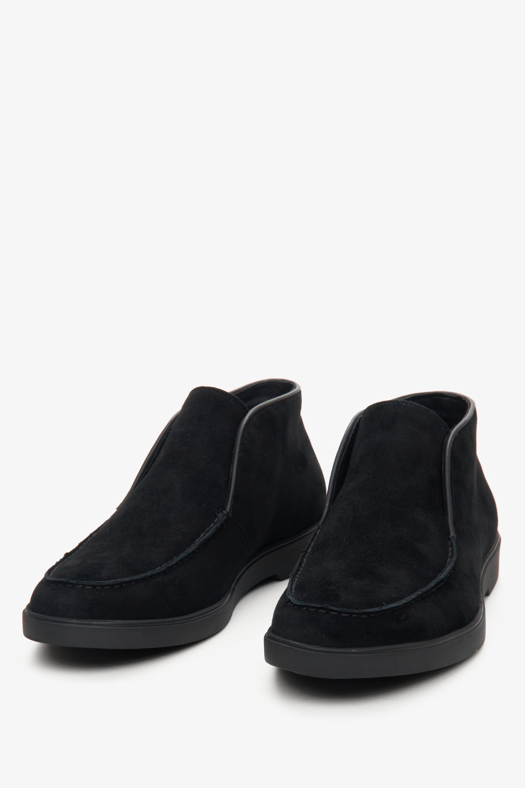 Men's black boots made of genuine velour in black colour - close-up on the toe of the shoe.