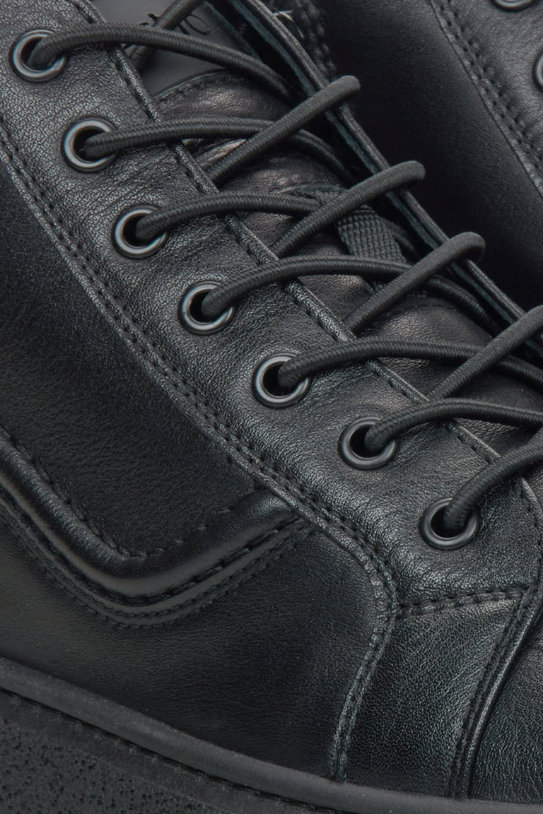 Men's black leather high-top sneakers Estro - close-up on the detail.