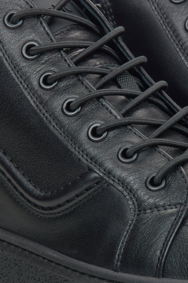 Men's black leather high-top sneakers Estro - close-up on the detail.