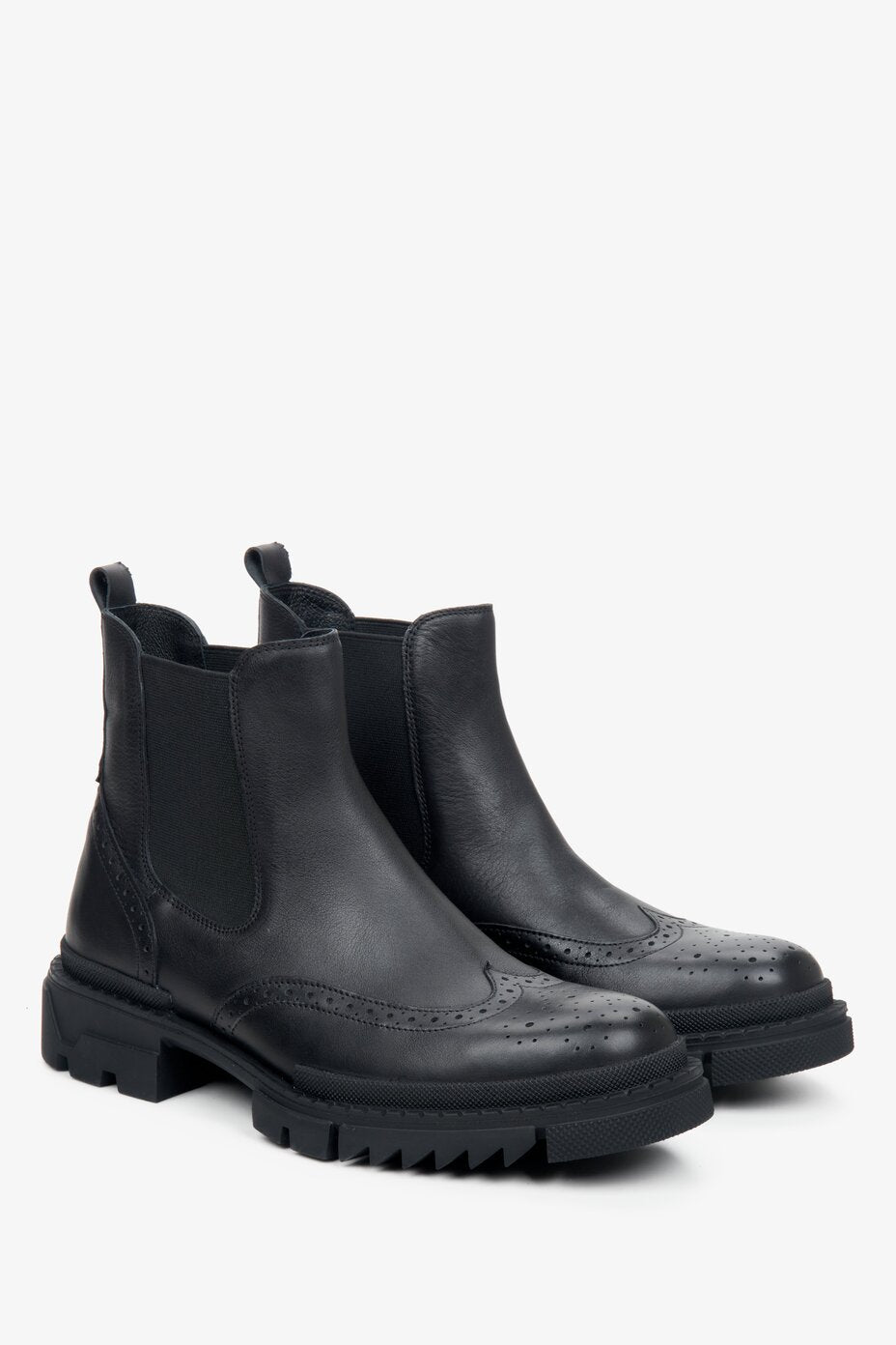 Men's black Chelsea boots by Estro made of genuine leather with perforation details.