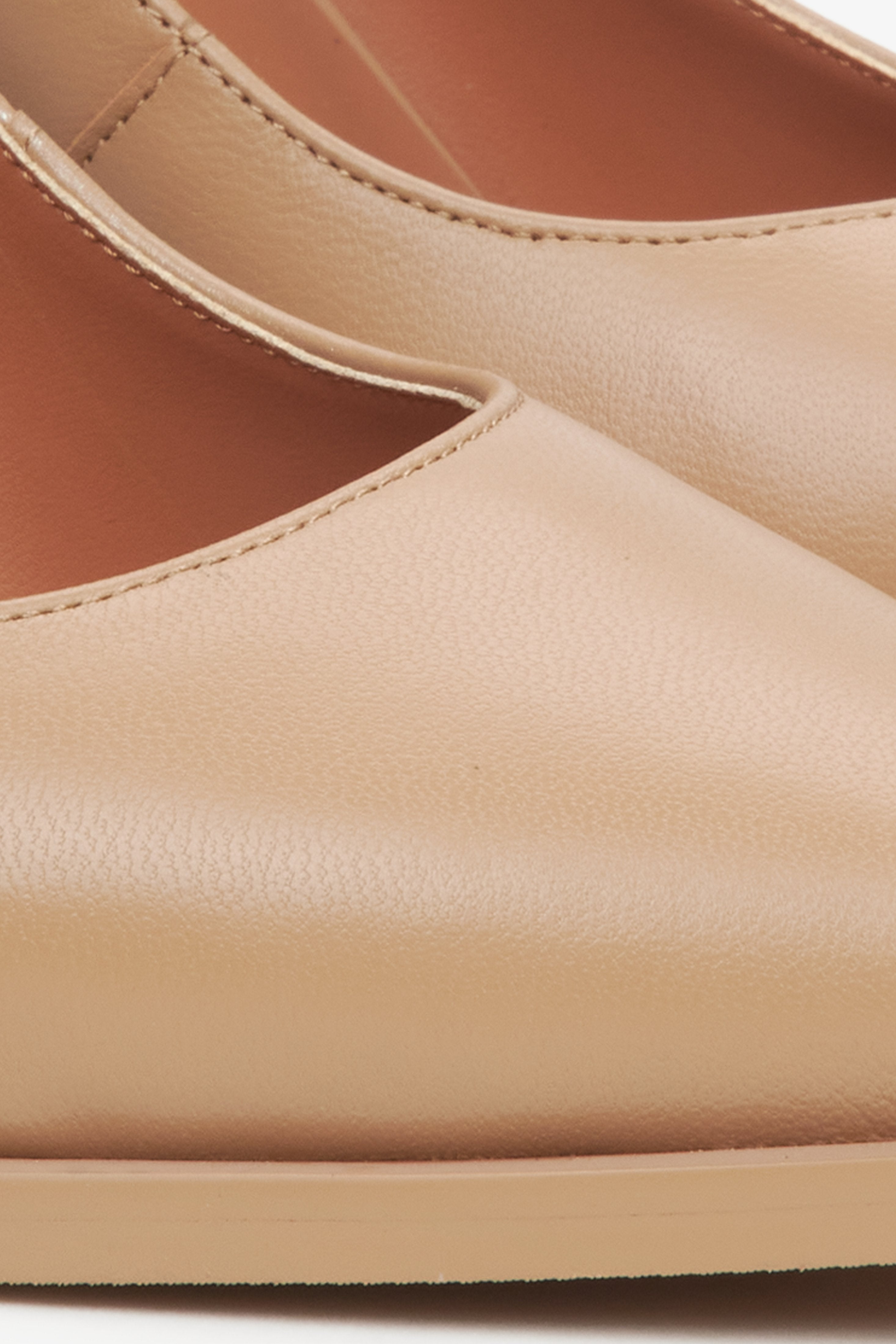 Women's beige leather pumps by Estro - close-up on detail.