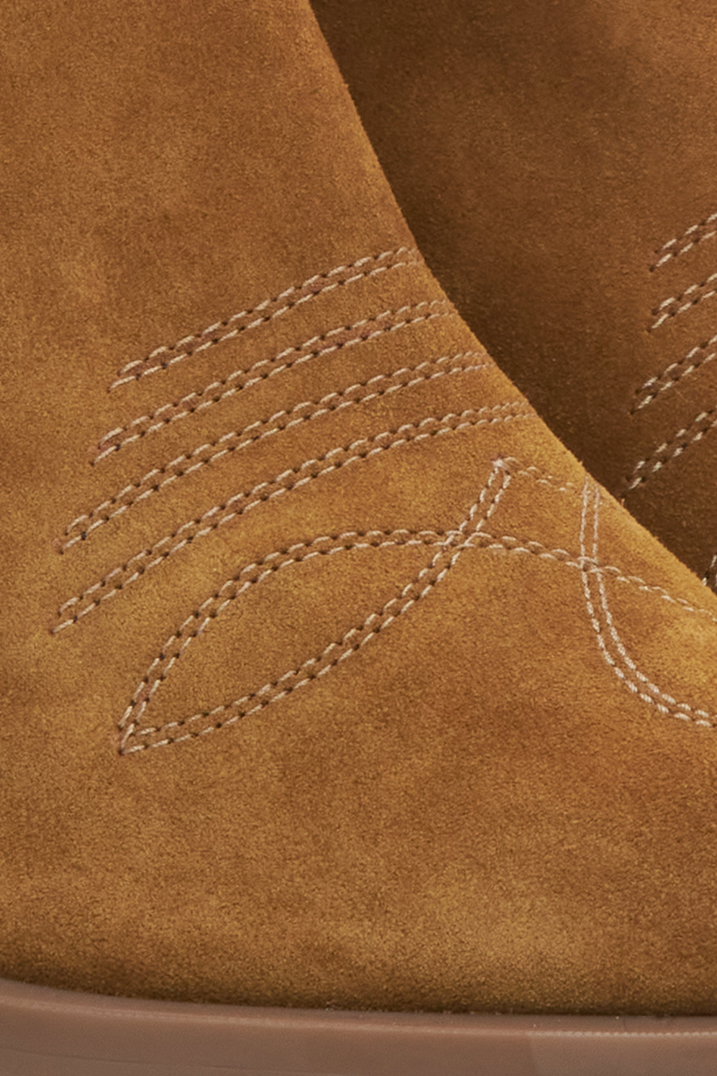 Brown velour women's cowboy boots - close-up of the detail.