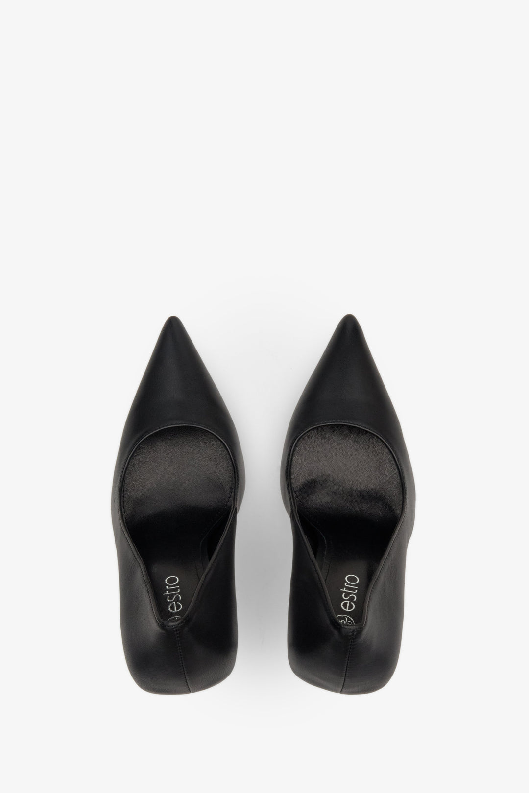 Women's black stiletto heels made of matte genuine leather - top view presentation of footwear.