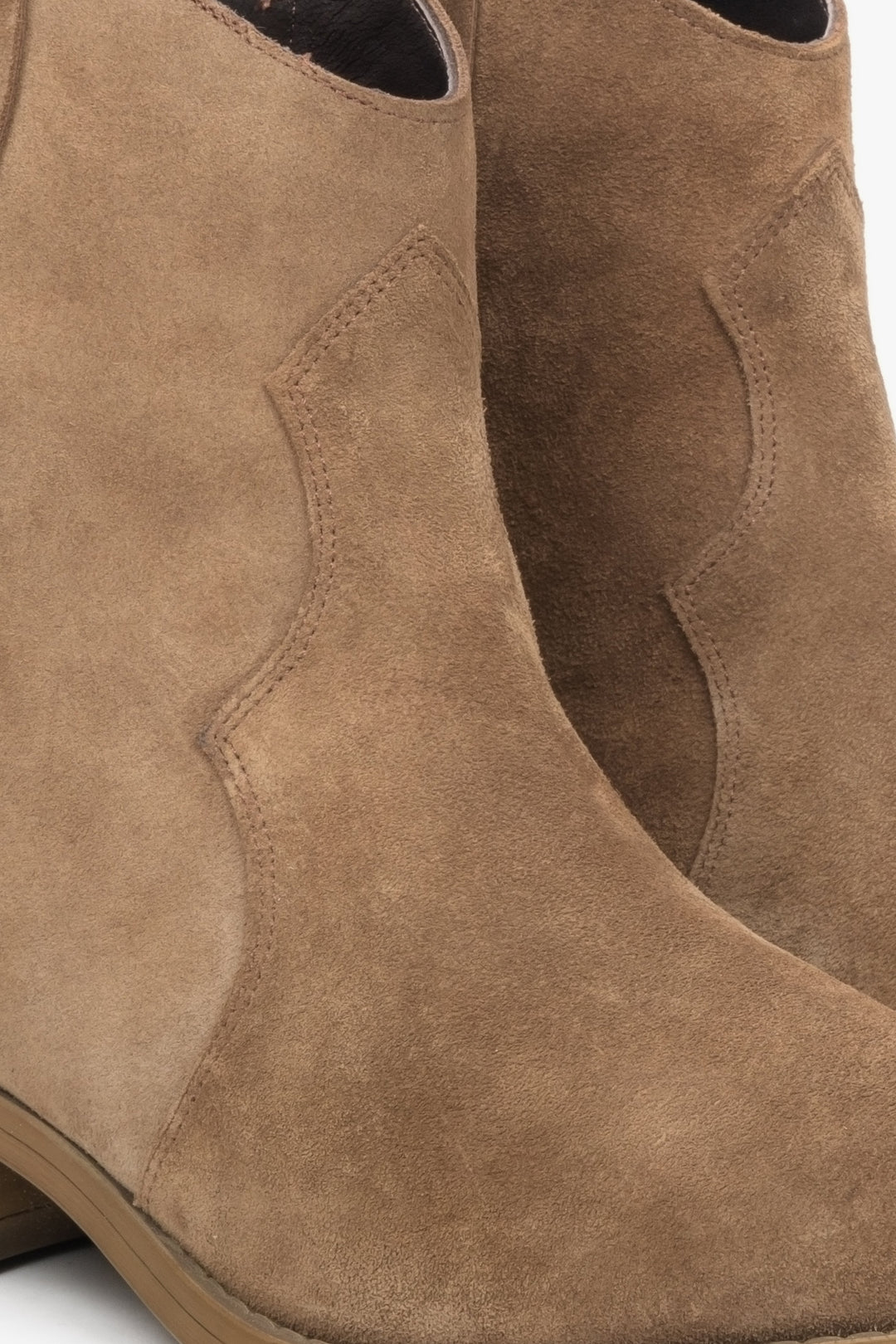 Women's brown velour pointed-toe cowboy boots by Estro.