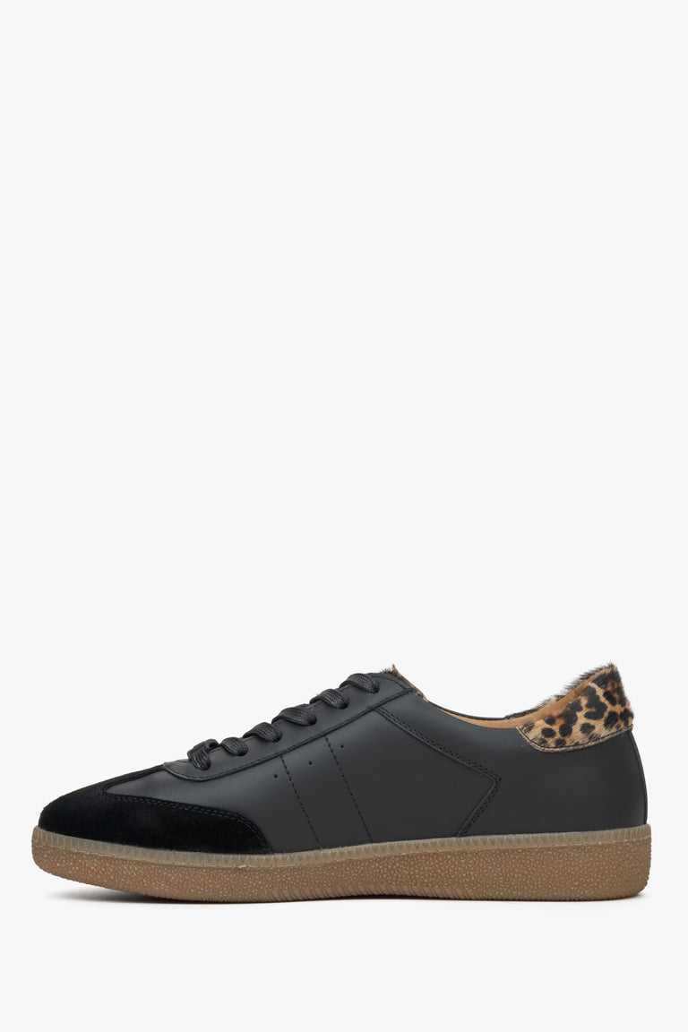 Estro women's black leather sneakers - side profile.