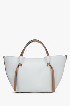 White boat-shaped handbag made of premium genuine leather.