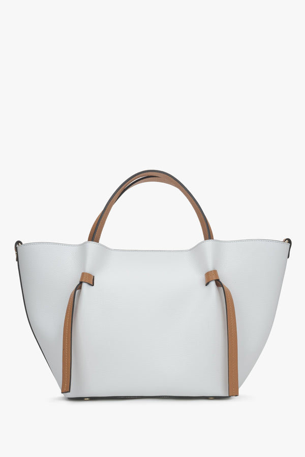 White boat-shaped handbag made of premium genuine leather.