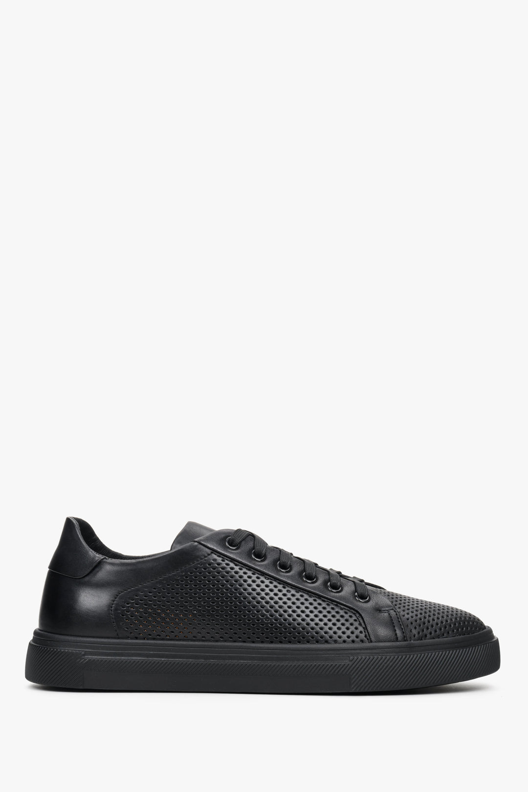 Men's black sneakers with perforations - shoe profile.