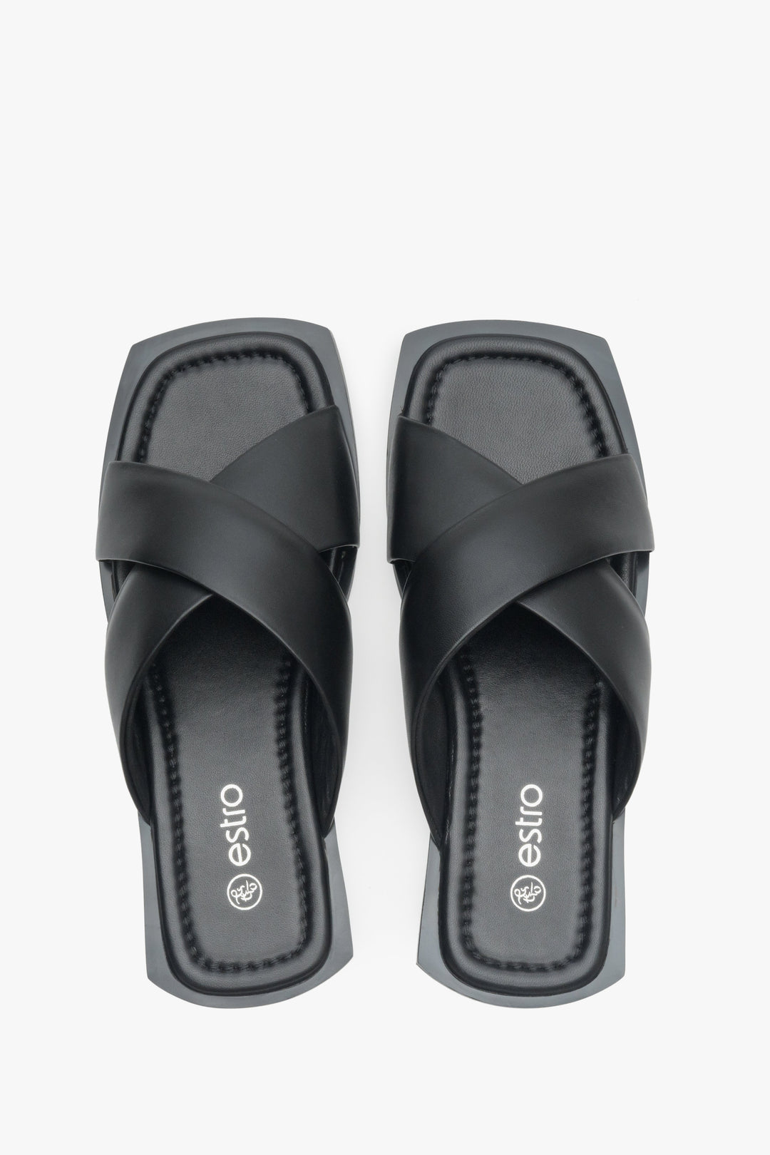 Women's slide sandals made of black genuine leather Estro - presentation form above.