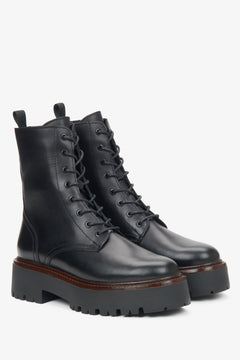 Black leather ankle boots for women by Estro.