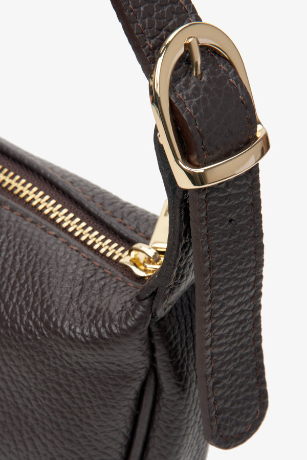 Women's dark brown small leather shoulder bag with gold accents by Estro - close-up of the details.