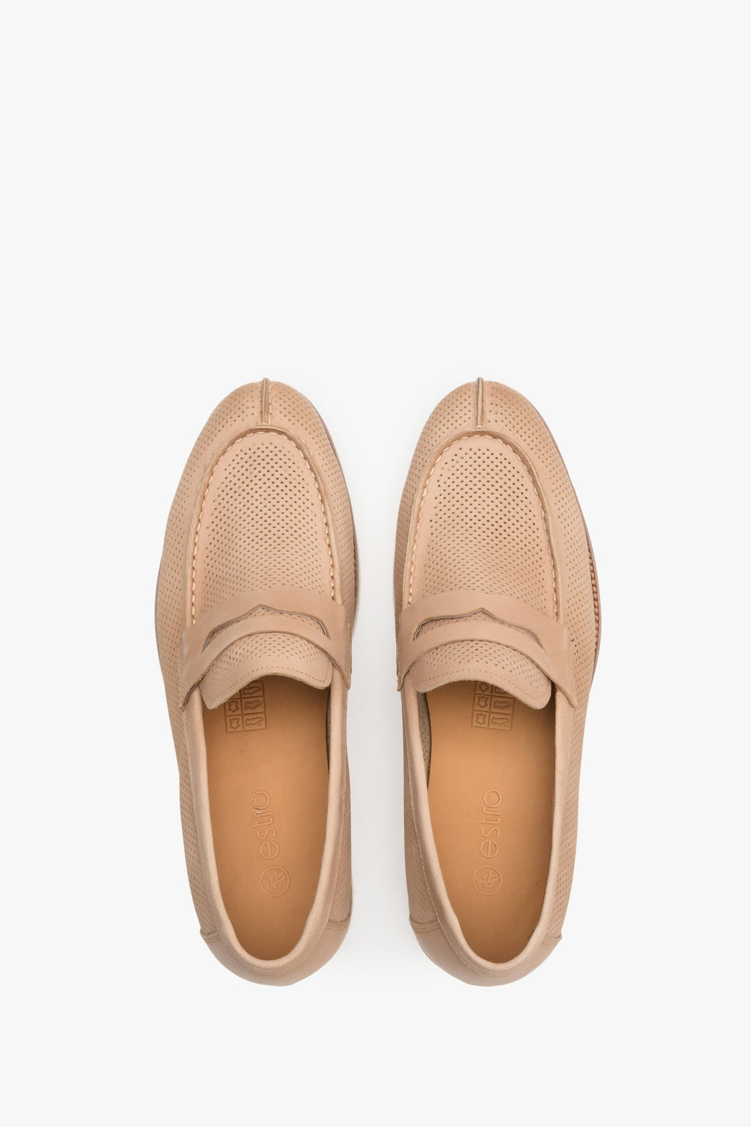 Stylish men's penny loafers made of beige genuine nubuck - presentation from above.