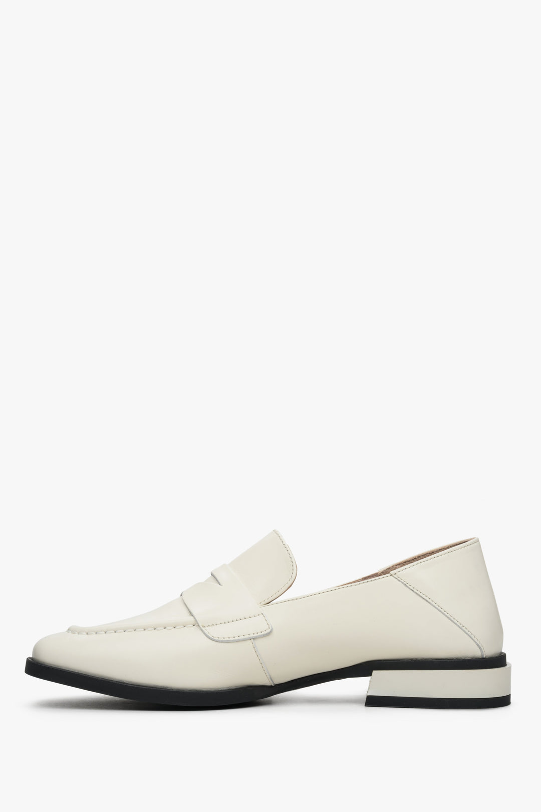 Women's white leather loafers with a low heel by Estro - shoe profile presentation.