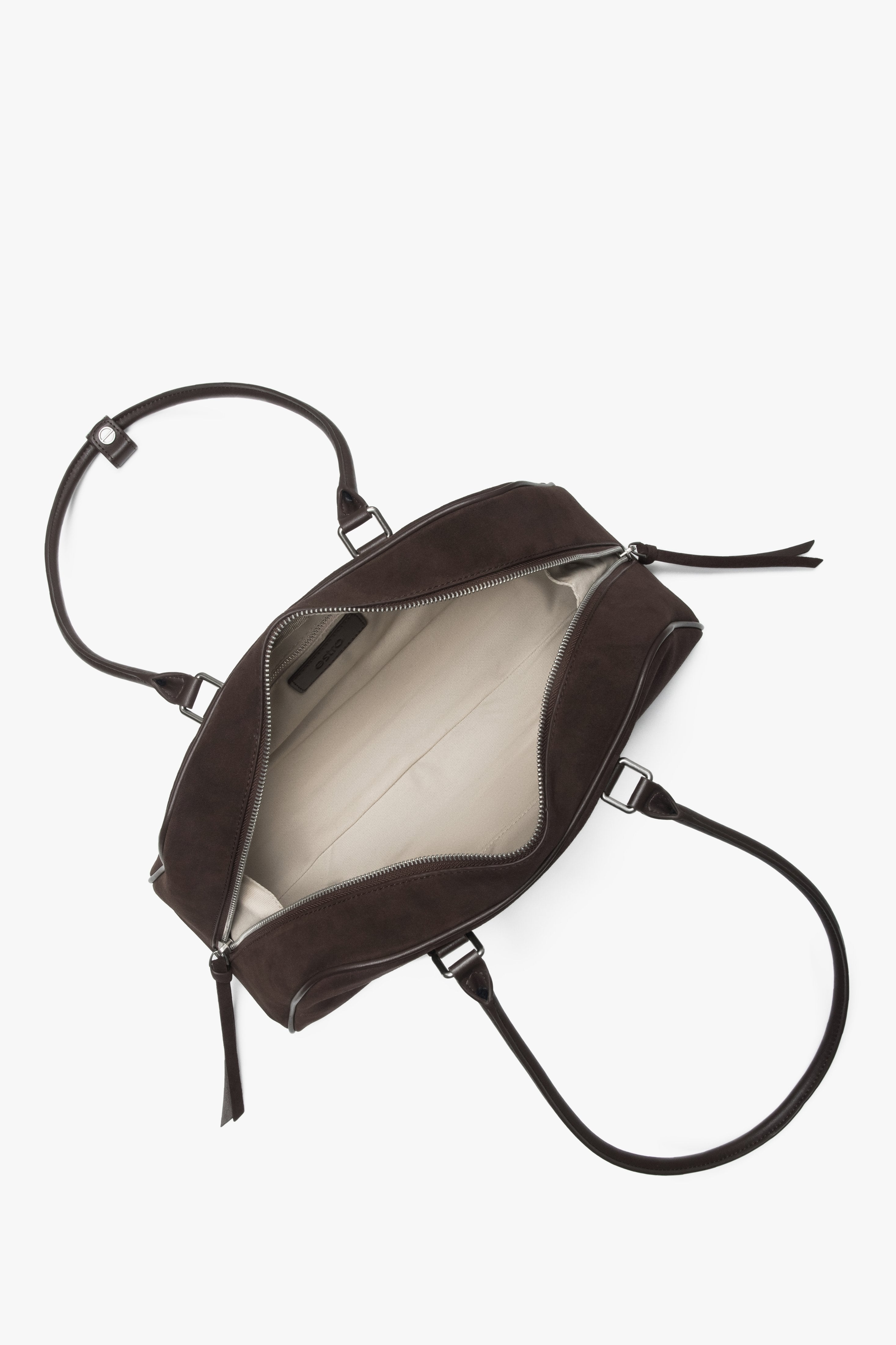 Front view of the women's Estro shoulder bag, showing the saddle brown velour and its long handle design.