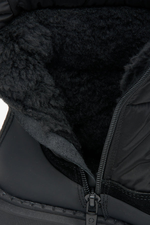 Black women's winter boots with insulation - close-up on the inside of the boot.