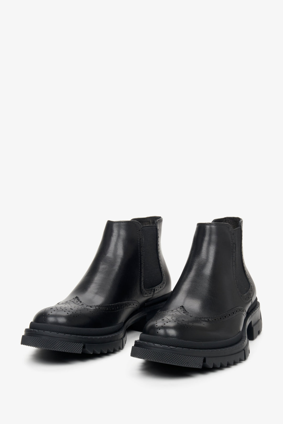 Versatile men's black ankle boots made from genuine leather by Estro - close-up on the toe of the boots.