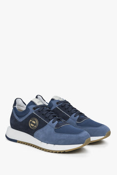 Men's black and blue velour sneakers by Estro.