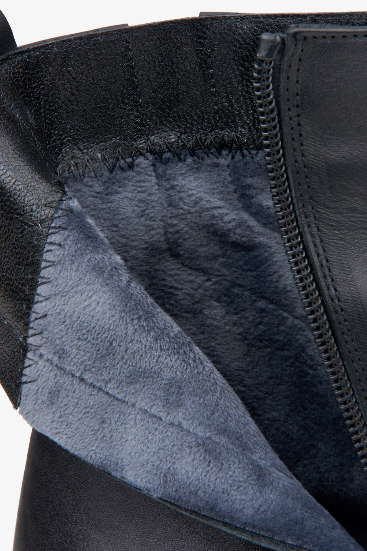 Women's black leather ankle boots - a close-up on details.