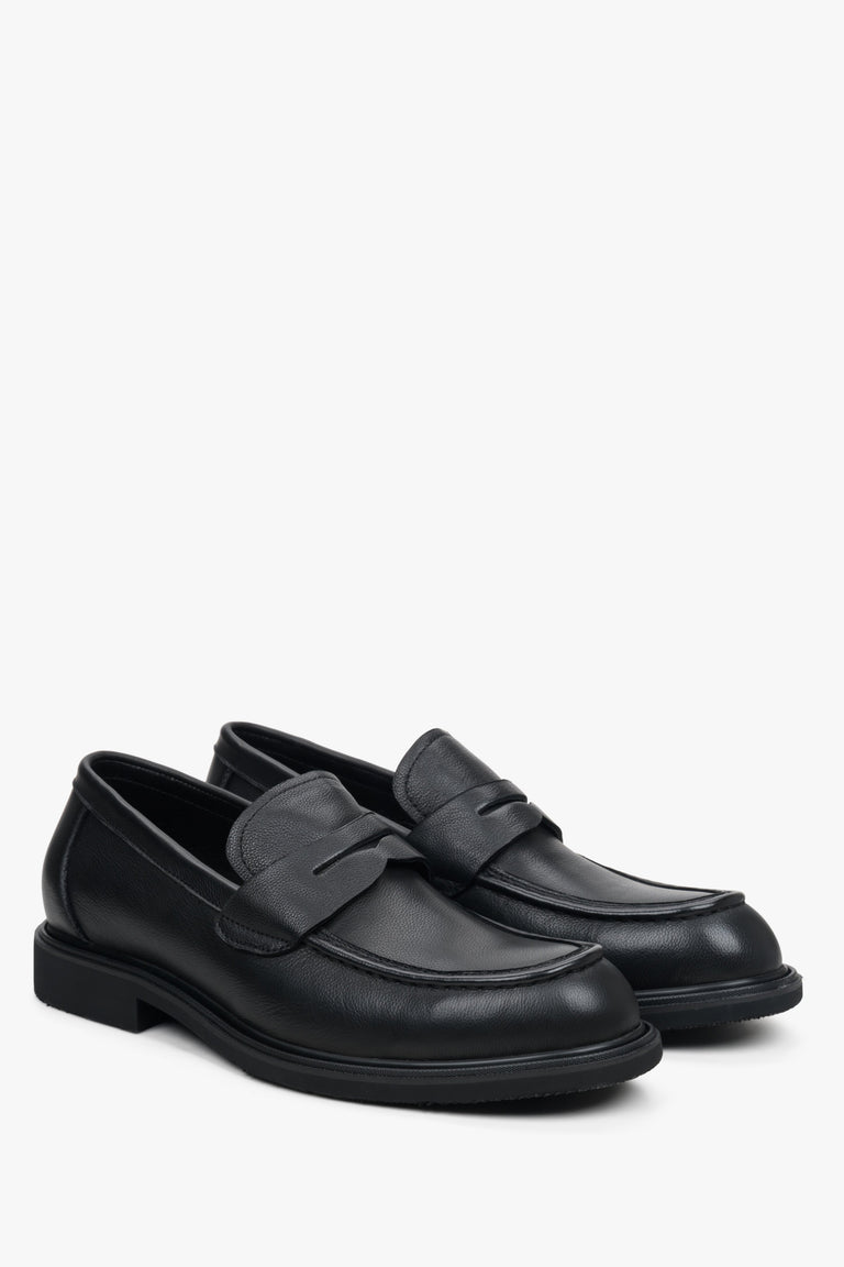 Men's black leather Estro loafers.