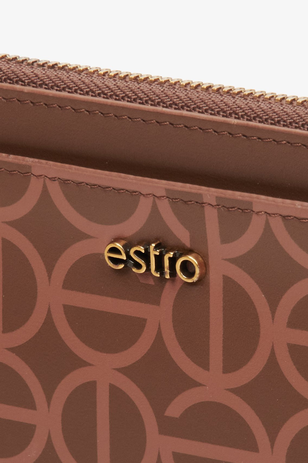 Women's, large brown wristlet made of genuine leather by Estro - close-up on the details.