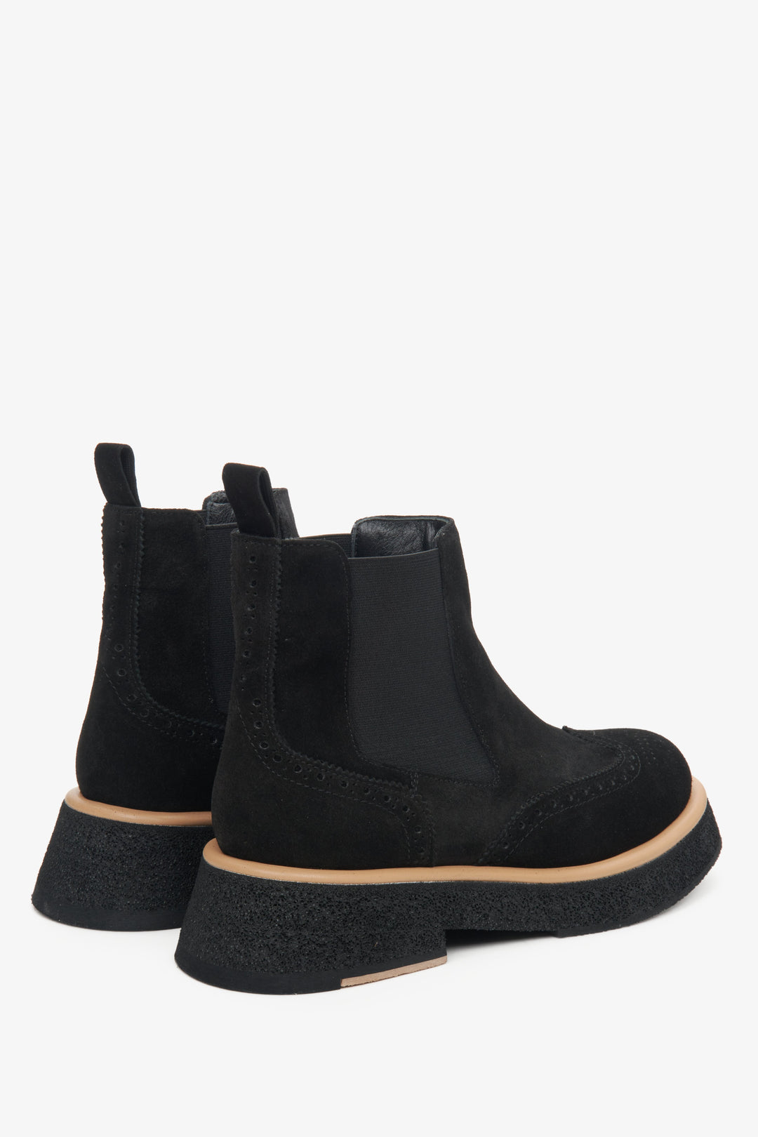 Women's black ankle boots with a comfortable heel made of natural suede by Estro - close-up on the side line and heel.