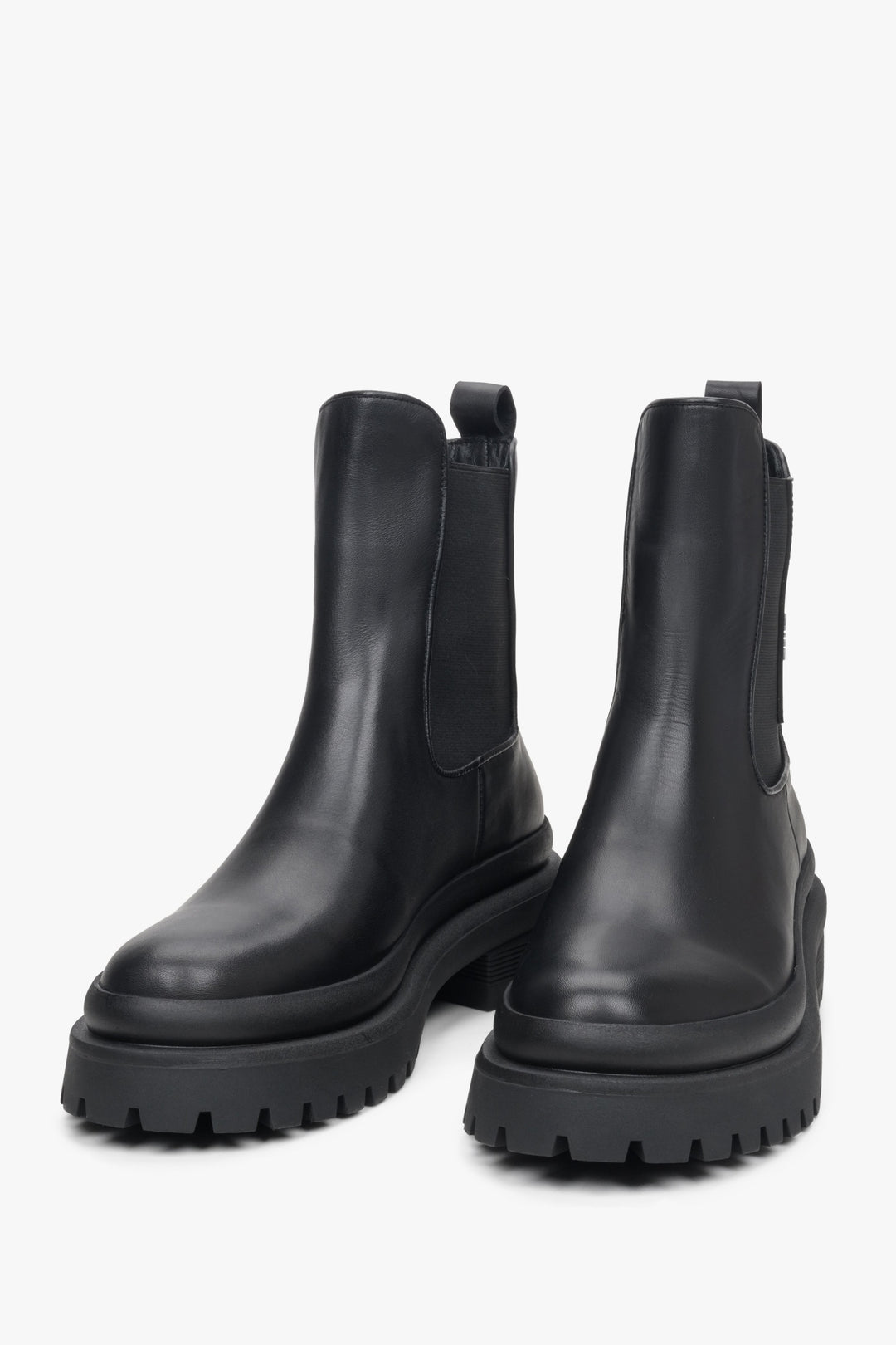 Comfortable women's black  ankle boots by Estro - close-up on the front of the model.