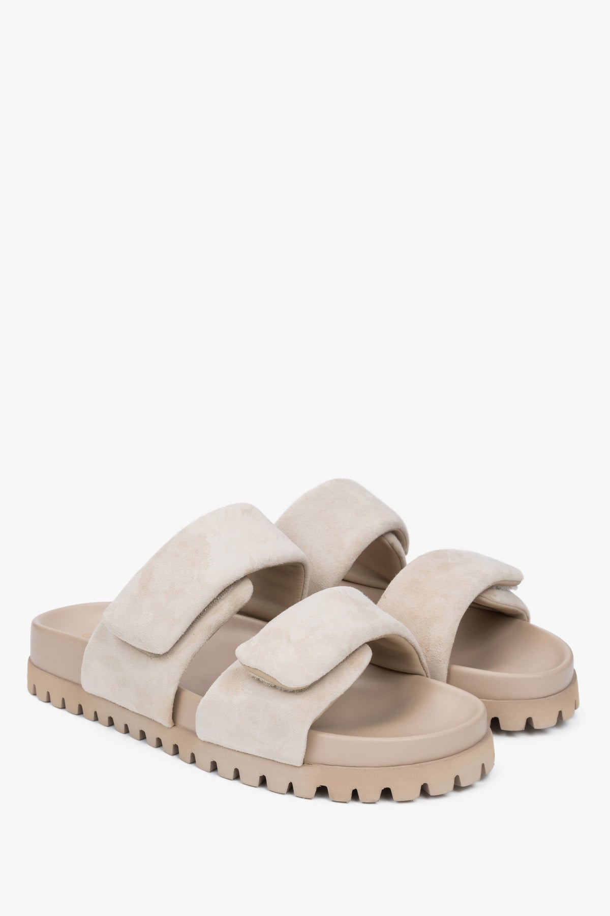 Comfortable light beige women's slides by Estro, made from genuine velour and featuring soft straps for added comfort.