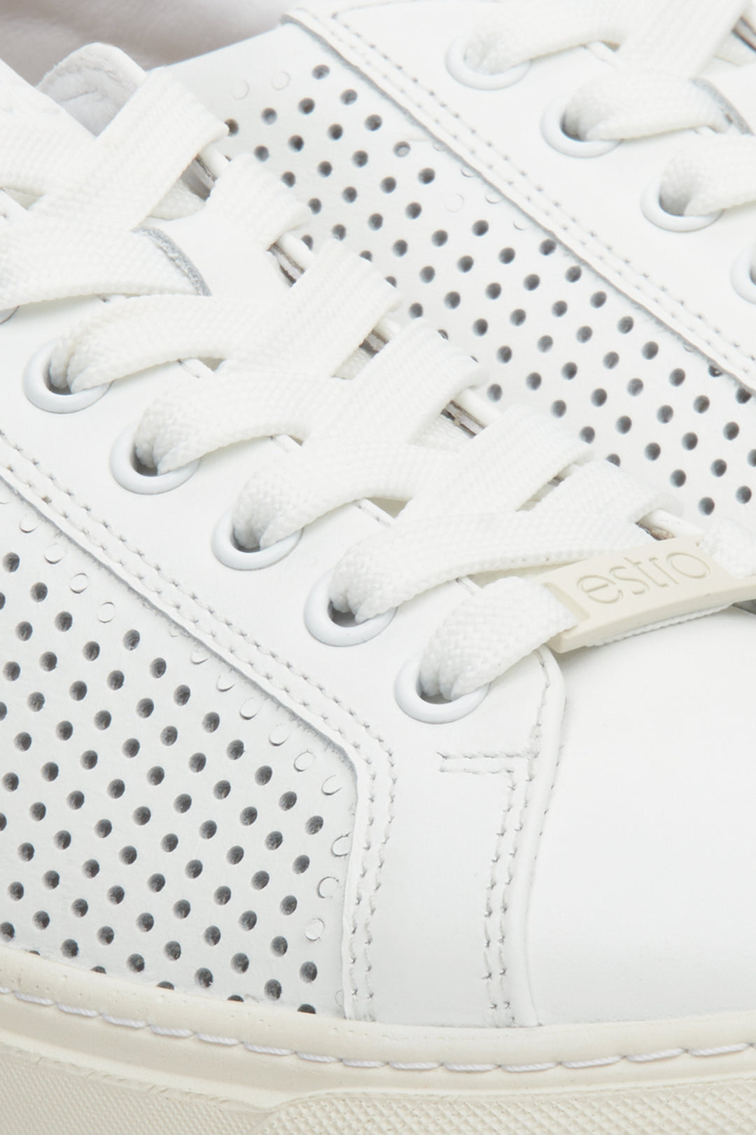 Women's white Estro fall/spring sneakers - close-up on details.