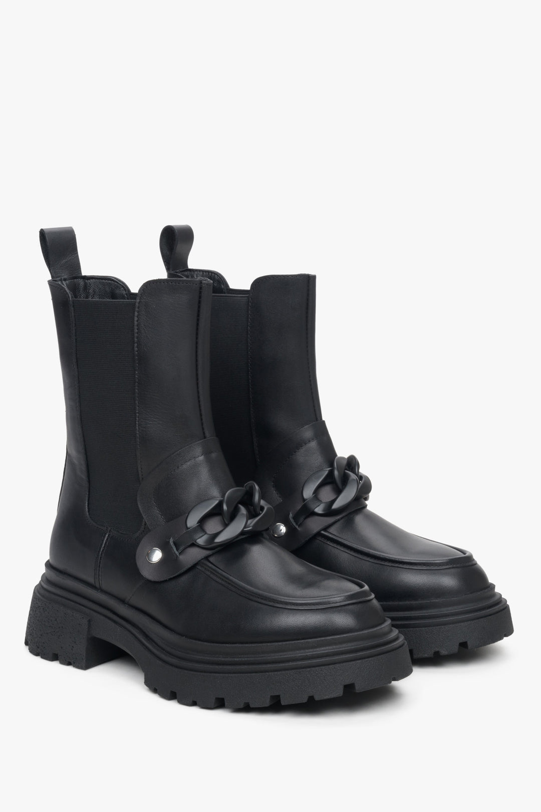 Women's black leather Chelsea boots by Estro with embellishment.