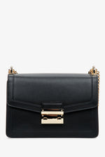 Women's leather black handbag with golden fittings and chain, Estro.