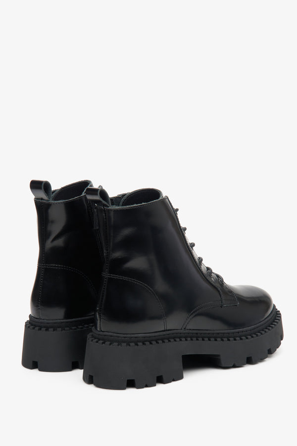 Women's black Estro low leather ankle boots - close-up on the heel and side profile of the boot.