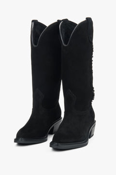 A pair of tall black Western-style boots for women, crafted from premium Italian velour.