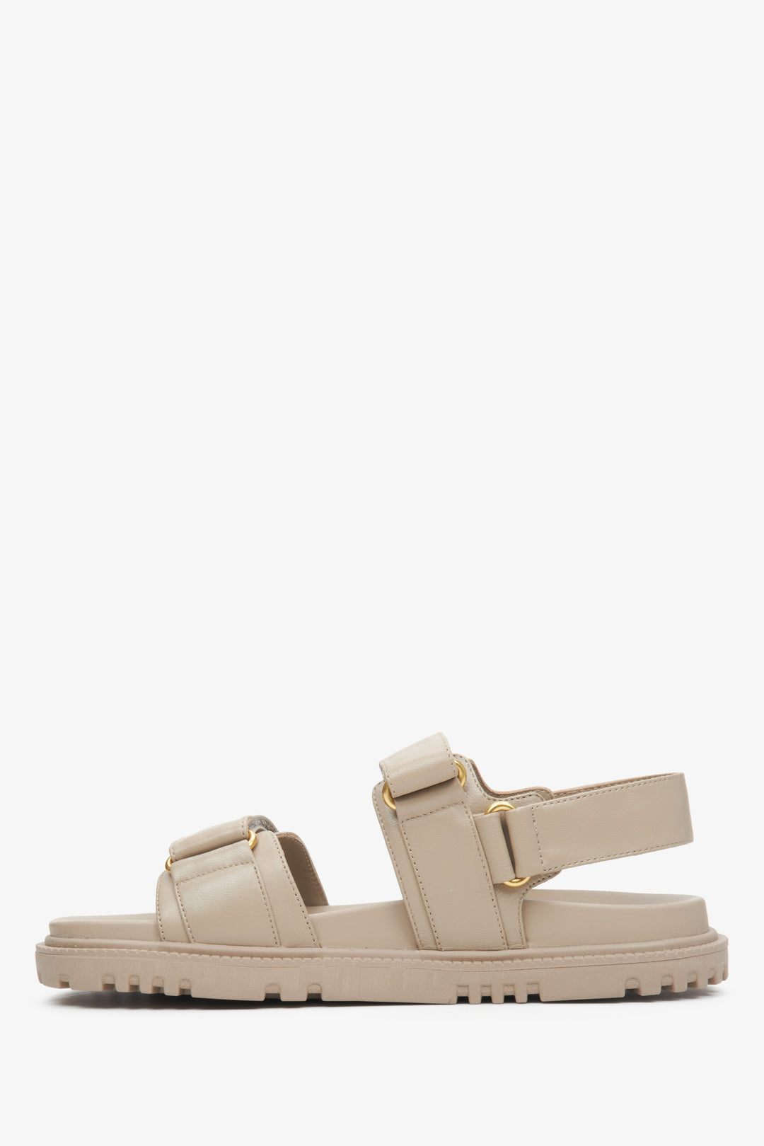 Estro women's beige leather sandals with a flexible sole and golden accents.