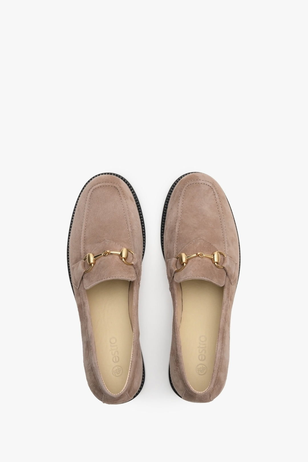 Elegant, beige women's loafers made of Italian suede - close-up form above.