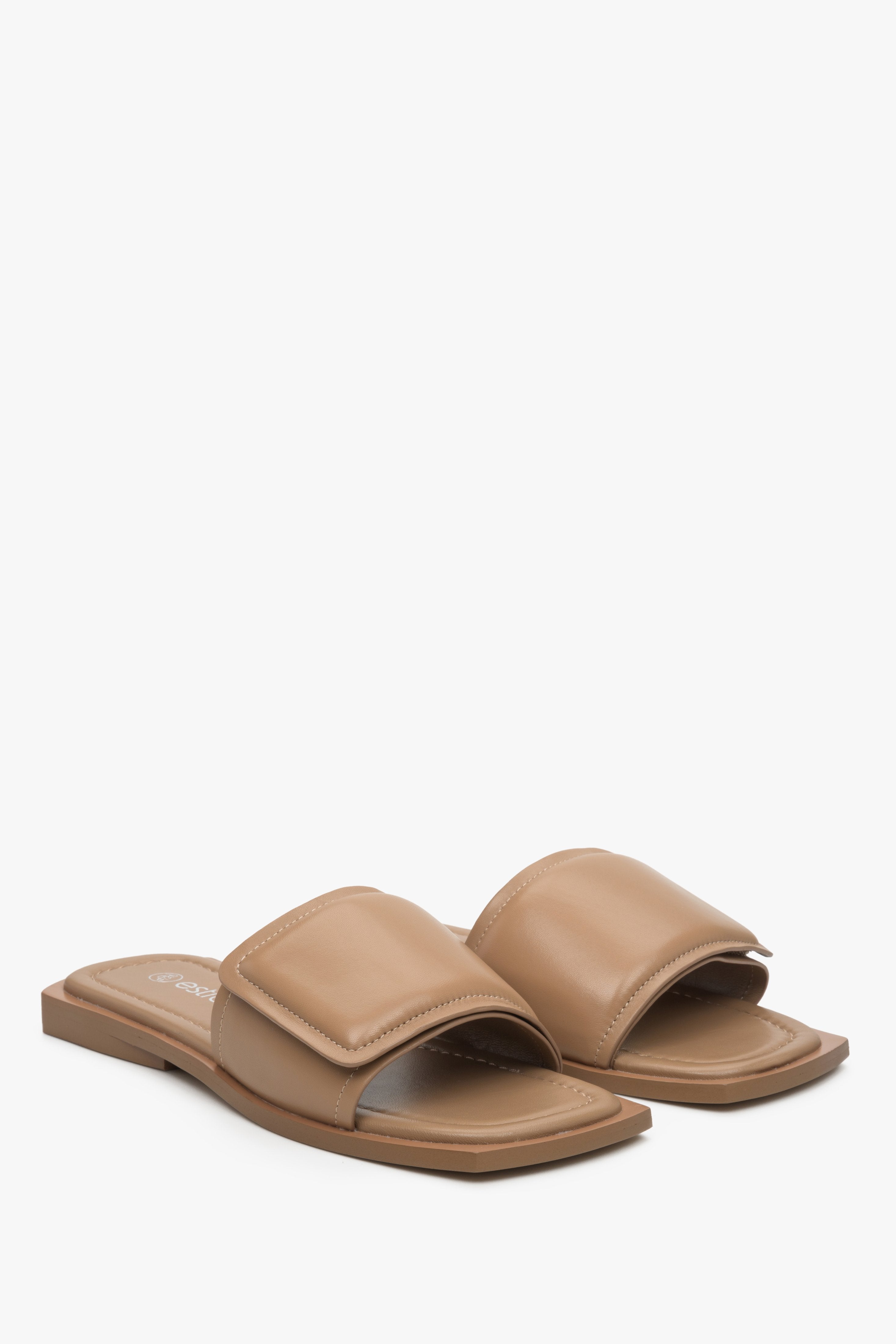 Genuine leather flat mules in brown.