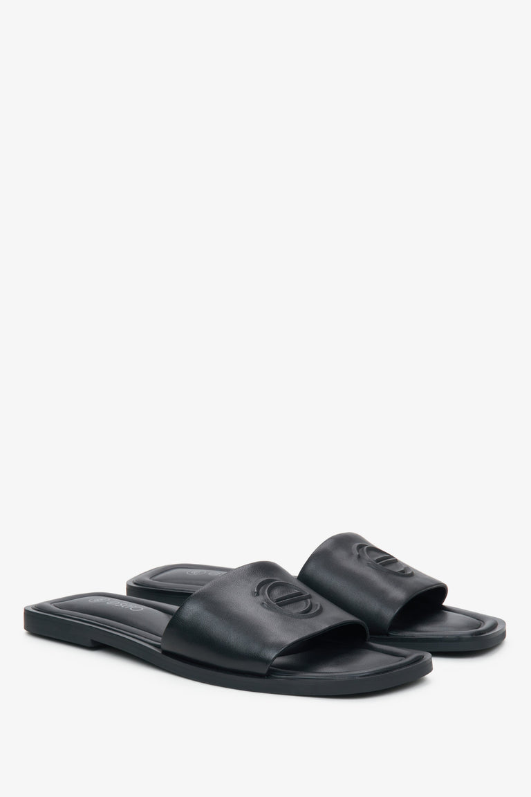 Estro women's black leather slides.