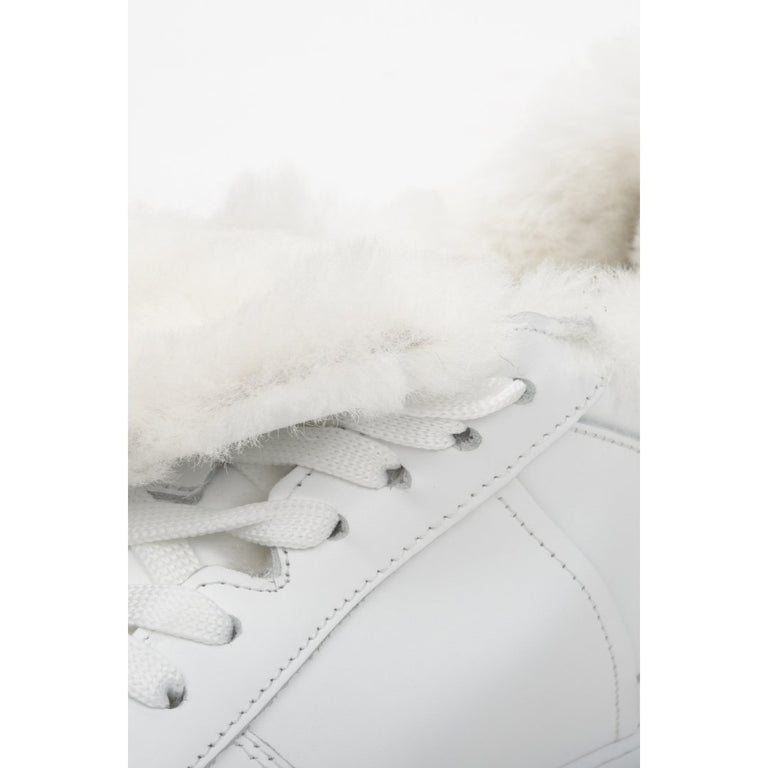 White leather insulated women's sneakers - close-up on details.